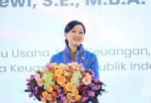 OJK Luncurkan Buku Saku Literasi Keuangan untuk Pekerja Migran Indonesia, Dorong PMI Cerdas Finansial